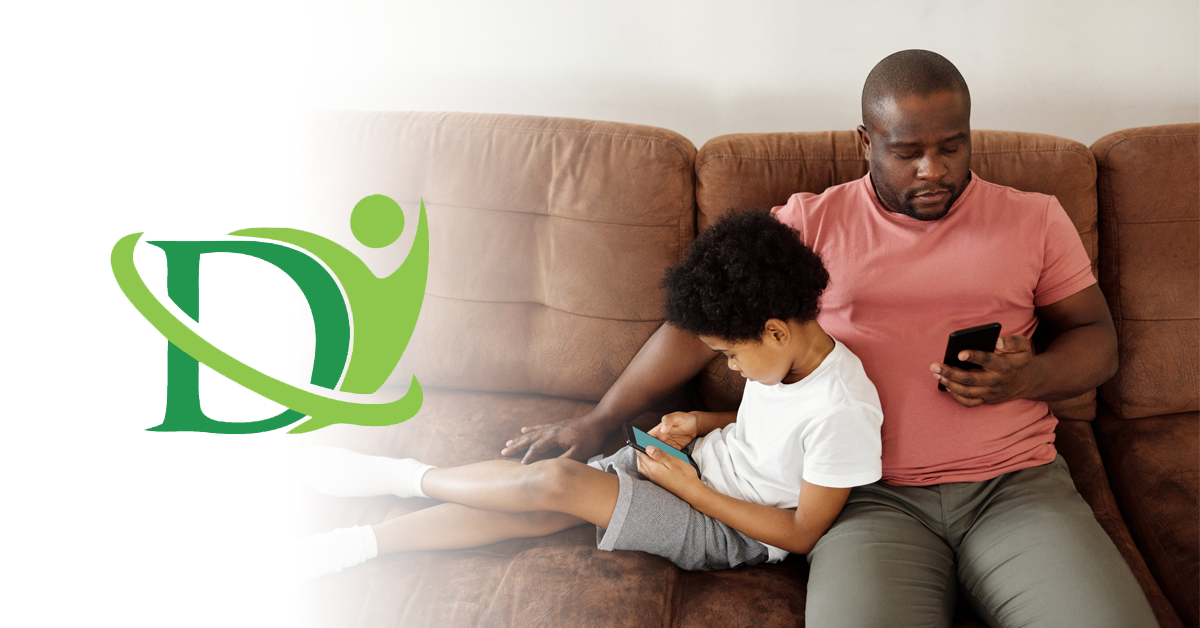 black man with son on couch, banner image