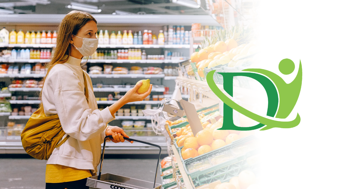 woman grocery shopping with mask